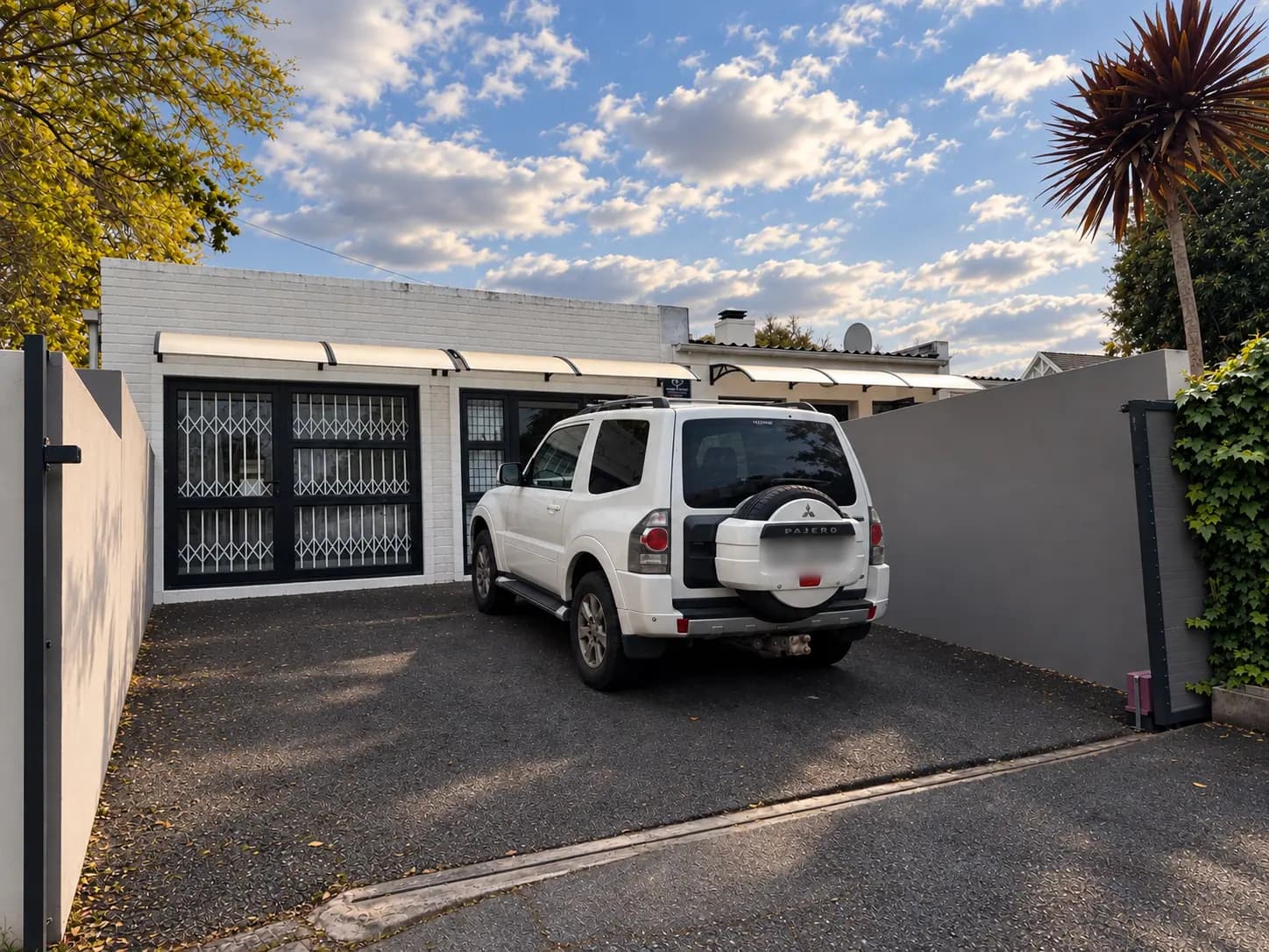 Secure off-street parking behind a gated entrance